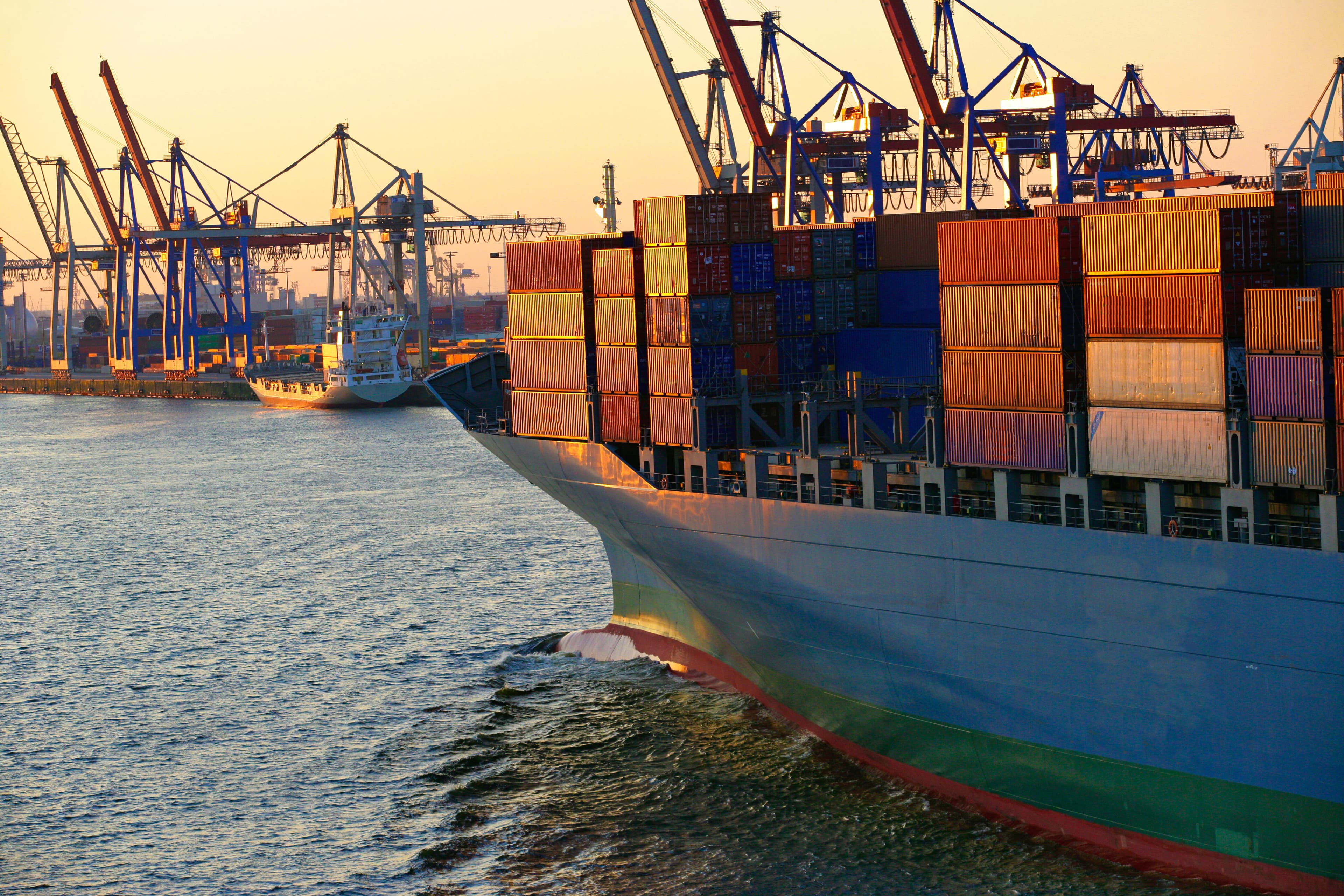 Container ship loaded with cargo at port